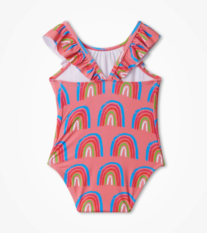 Back view of Hatley Lucky Rainbows baby ruffle swimsuit with pink rainbow print