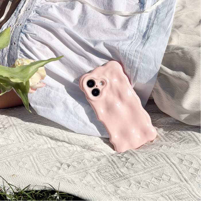 Girl at a picnic with flowers close up image of the 3D Bubble Phone Case in Powder Pink