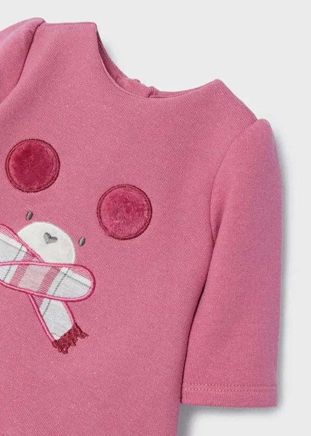 Closeup of Mayoral baby girls fleece dress showing embroidery, soft Pink fabric, and long sleeve detail.