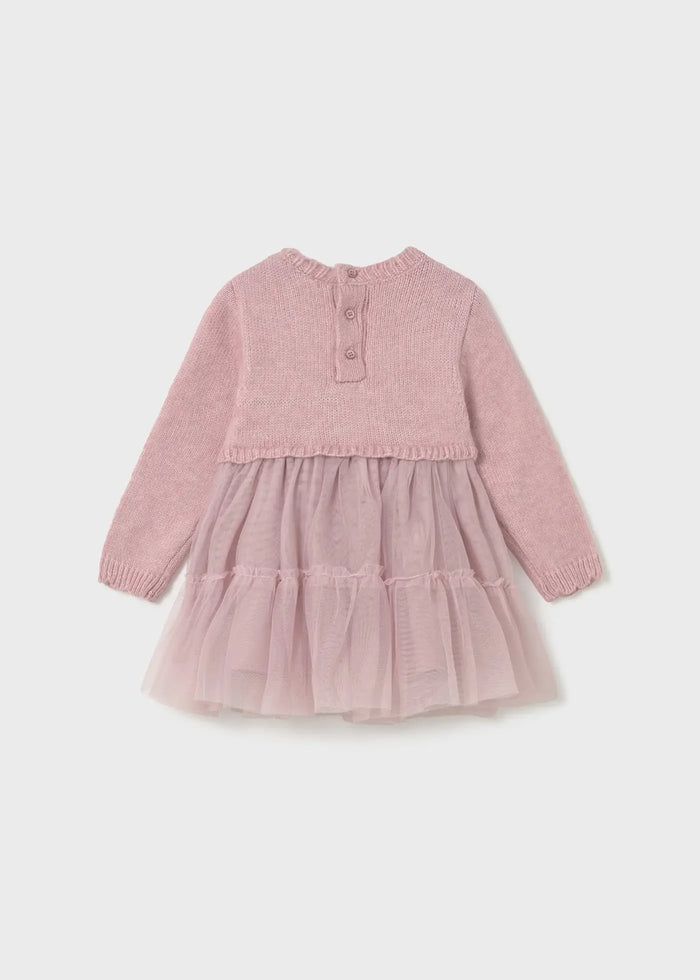 Flat lay back view showing button fastening