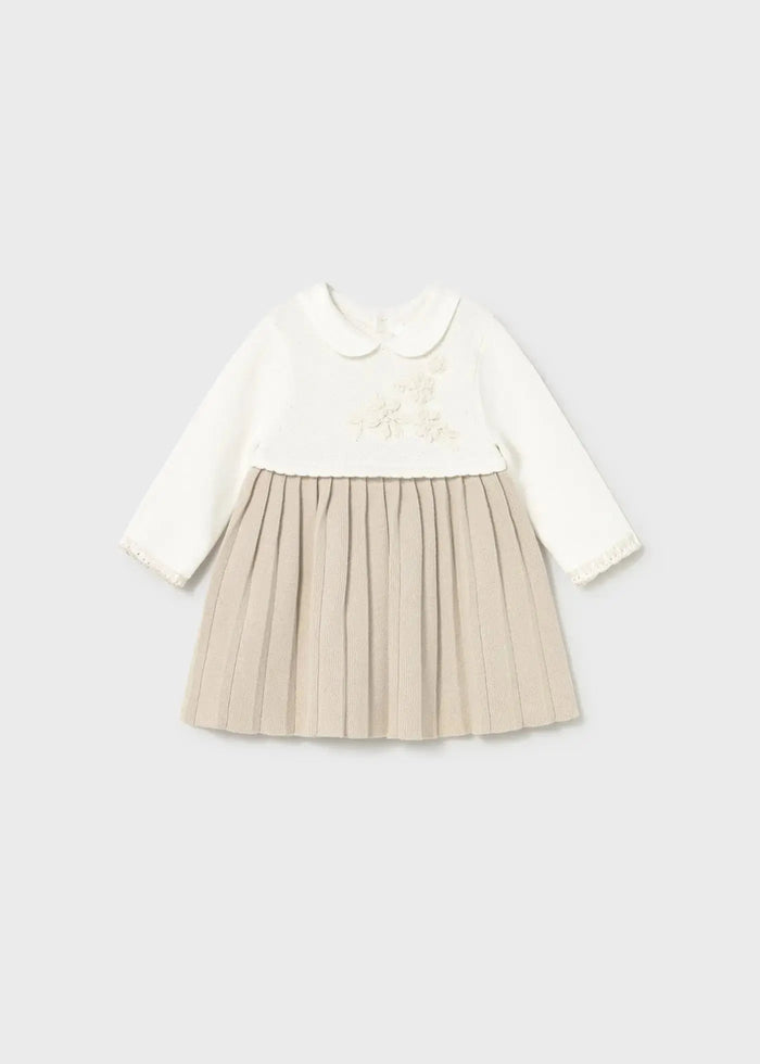 Flat lay front view of Mayoral baby knit dress