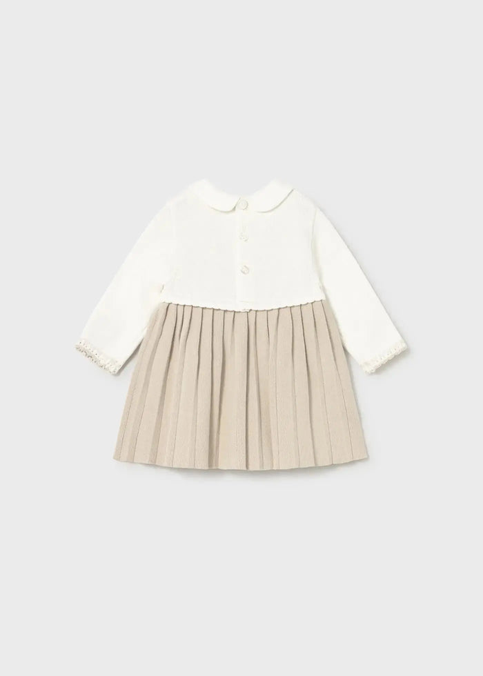 Flat lay back view of Mayoral baby knit dress with button closure