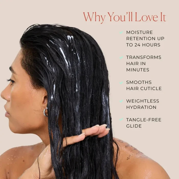 Woman applying curly hair product for moisture and tangle-free glide