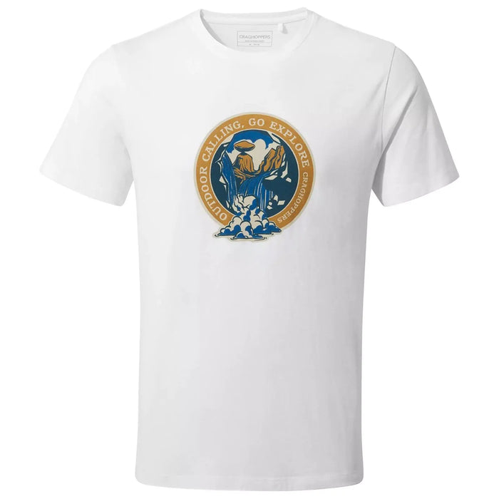 A white t-shirt features a circular logo with mountains and clouds underneath the text OUTDOOR CALLING GO EXPLORE in a combination of blue and gold colors.