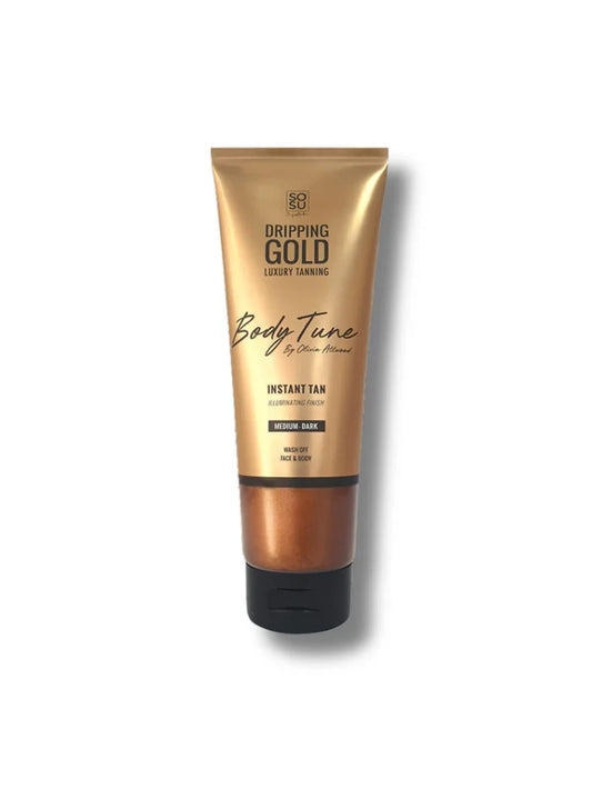 Dripping Gold body tanning gel tube on a white background