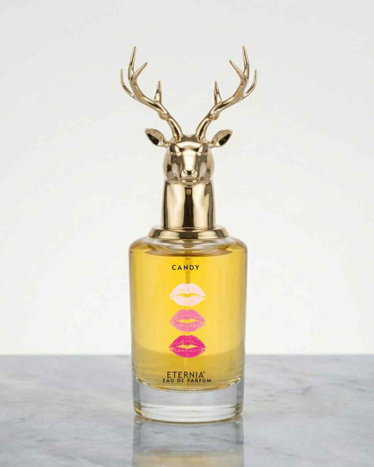 Eternia Candy Eau de Parfum bottle with deer-head gold cap and amber liquid