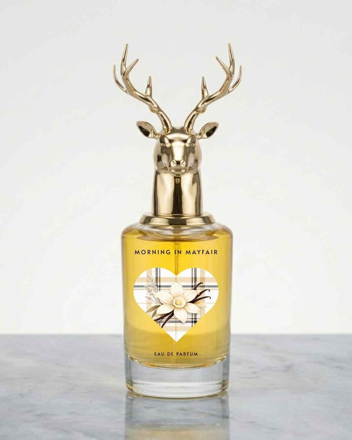 Gold deer-antler eau de parfum bottle with amber glass and floral label