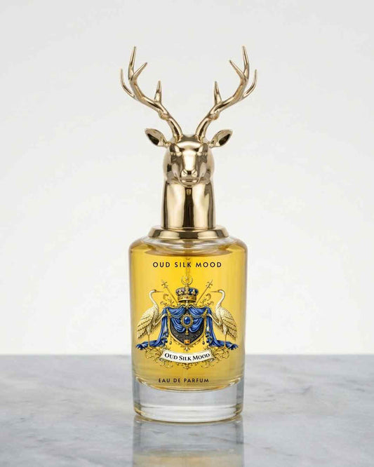 Eternia® Oud Silk Eau de Parfum bottle with deer-head cap and gold label