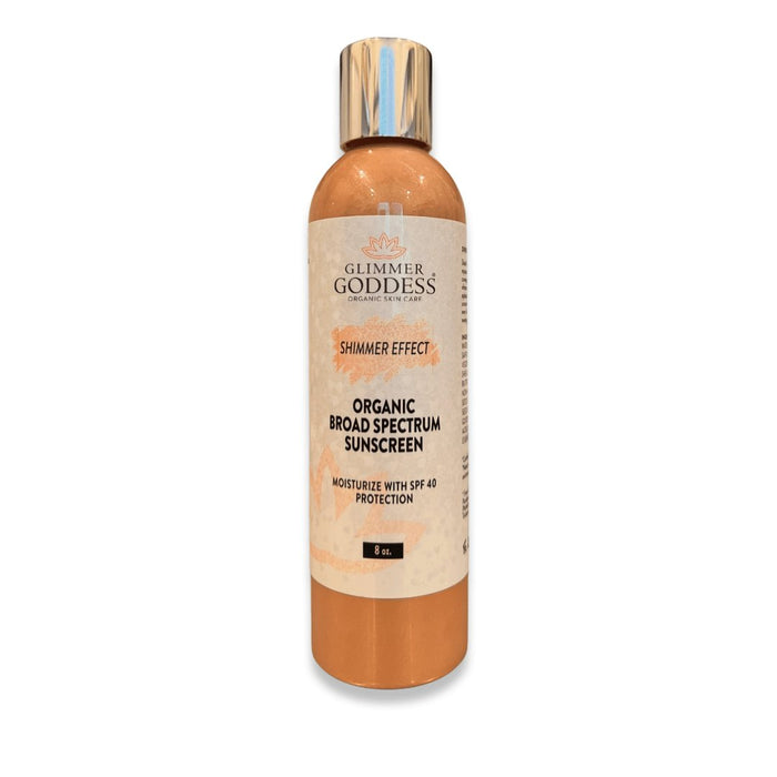 Organic broad spectrum sunscreen with shimmer effect, SPF 40 moisturizer in gold bottle