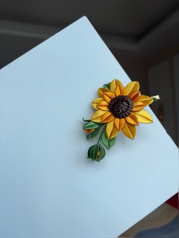 Handmade Chanhua sunflower hair clip on a white surface-2