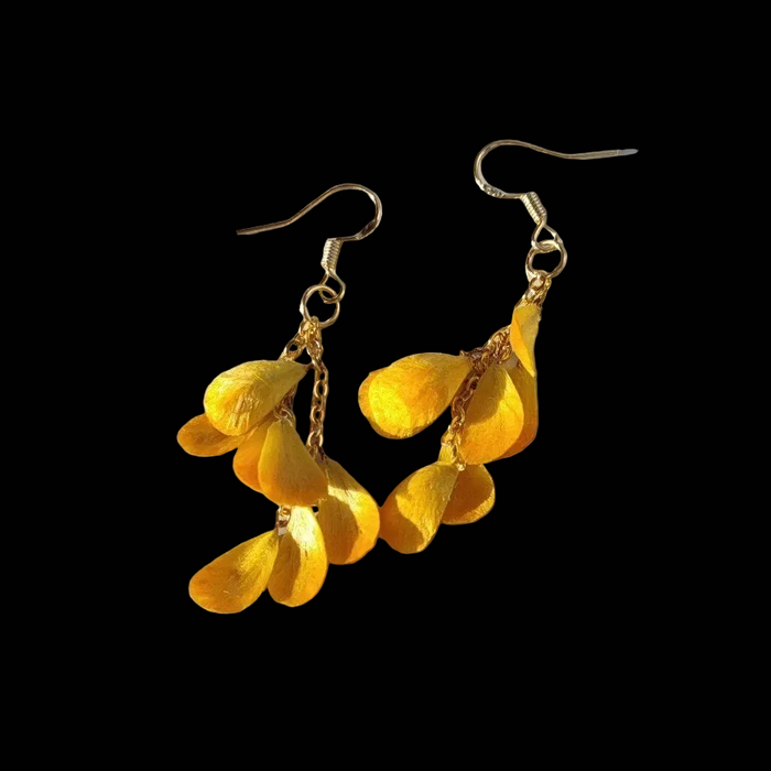 Handcrafted golden Osmanthus tassel Ronghua earrings with cascading velvet-textured silk petals on gold-tone chains.