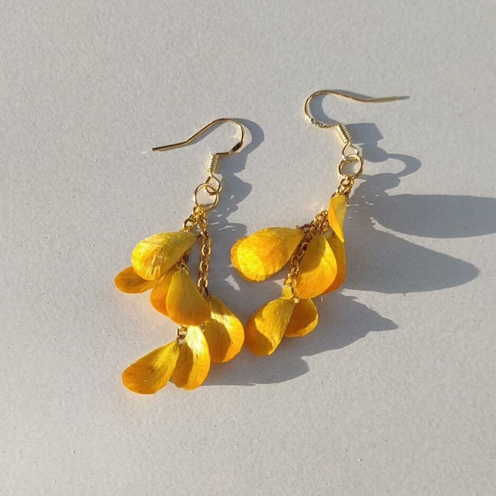 3D silk velvet floral dangle earrings featuring yellow osmanthus petal clusters made with traditional artisanal Ronghua techniques.