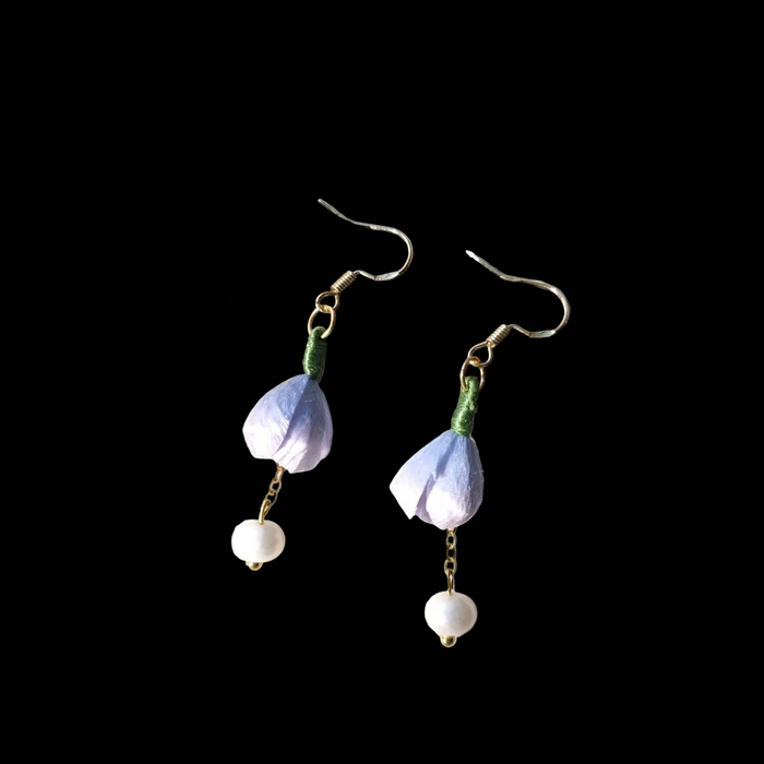 Handcrafted light purple flower bud Ronghua earrings with soft velvet-textured silk petals and delicate pearl drops on gold-tone hooks.