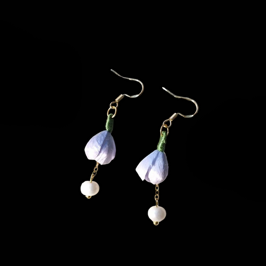 Handcrafted light purple flower bud Ronghua earrings with soft velvet-textured silk petals and delicate pearl drops on gold-tone hooks.