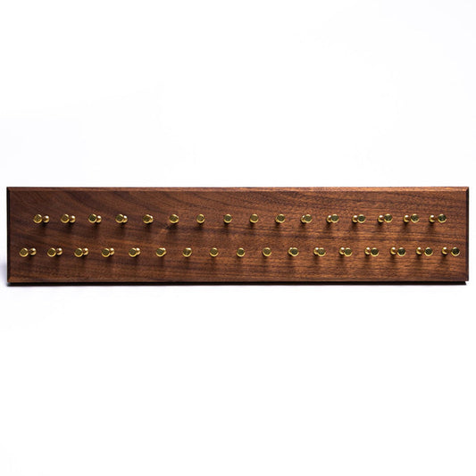 A Hanger Project Medium Tie Rack - Walnut/Brass Pegs from KirbyAllison.com for a Texas hanger project.
