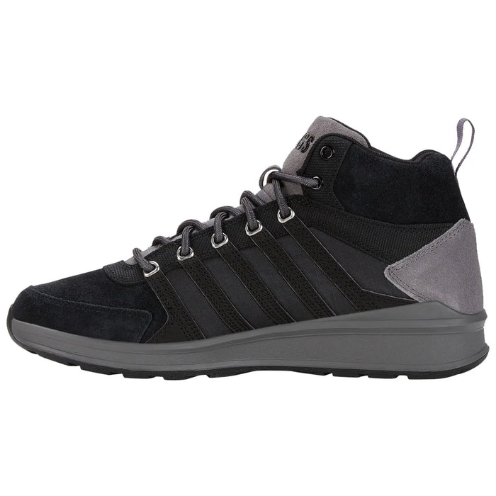 A black and gray high-top sneaker features a textured upper with suede and mesh materials laced through metallic eyelets sitting on a thick rubber sole designed for comfort and support.