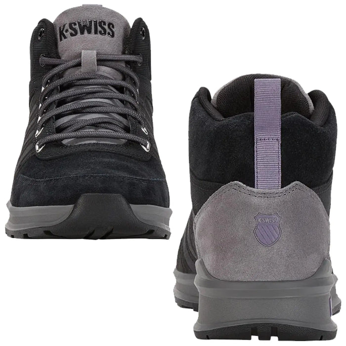 Two black and gray athletic shoes are displayed prominently from the front and back angles showcasing a sleek design with laces highlighting the brand K-Swiss on the tongue and heel.