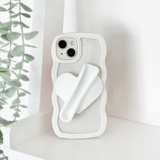 White Coconut Lane lip gloss holder sticker with a wavy-edged heart design attached to a phone case.