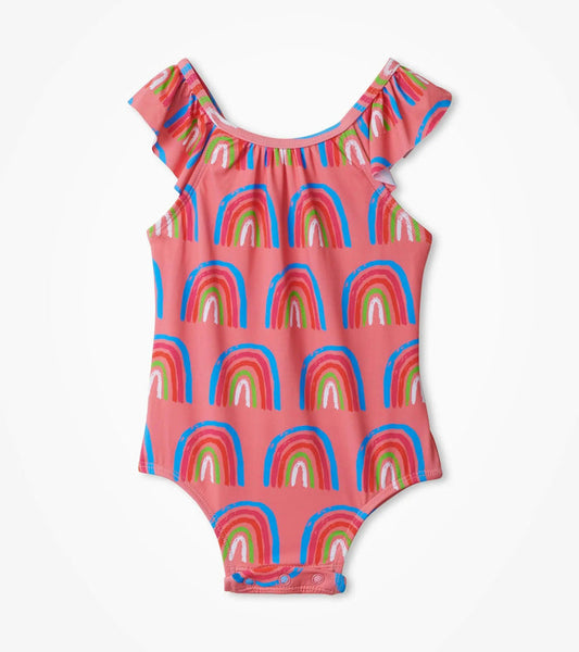 Hatley baby girl Lucky Rainbows ruffle swimsuit in pink with rainbow print and snap inseam