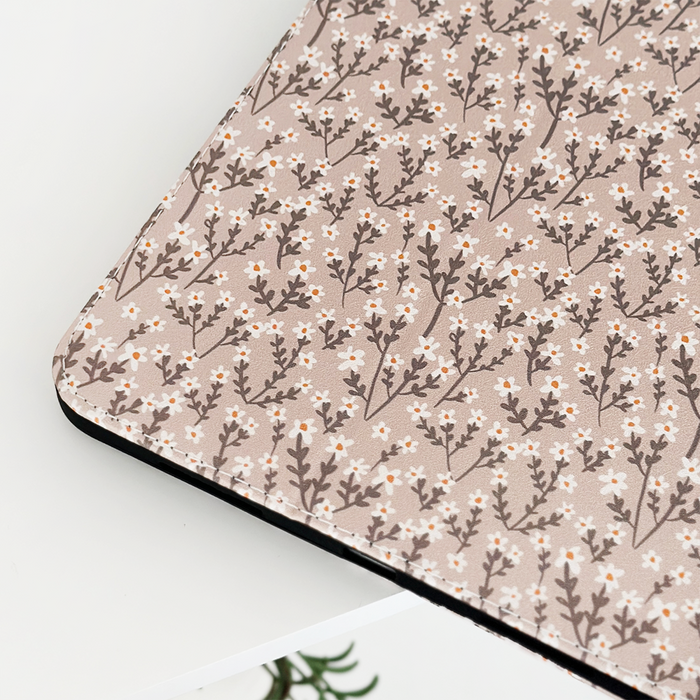 Coconut Lane Nude Flowers iPad case with beige floral pattern and white branch details.
