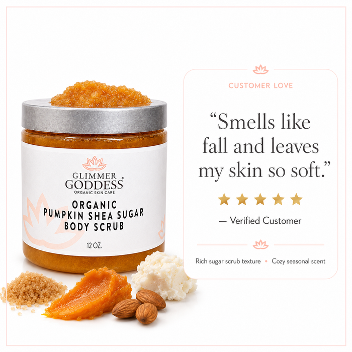 Glimmer Goddess Organic Pumpkin Shea Sugar Body Scrub jar on a white background with a customer testimonial card saying it smells like fall and leaves skin soft.