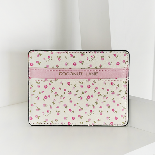 Pink card holder with a watercolour floral pattern by Coconut Lane.