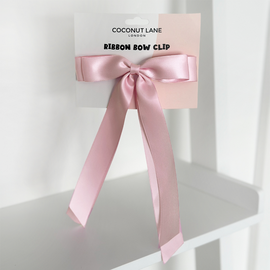 Peony pink ribbon bow hair clip displayed on a white card with Coconut Lane and Ribbon Bow Clip text.