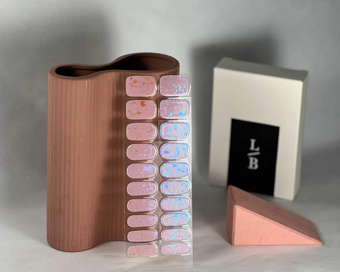 Pink Speckle semi-cured gel nail wraps on a nail mock-up