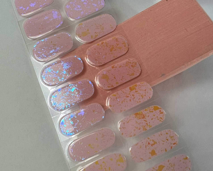 Pink Speckle gel nail wraps, angled close-up