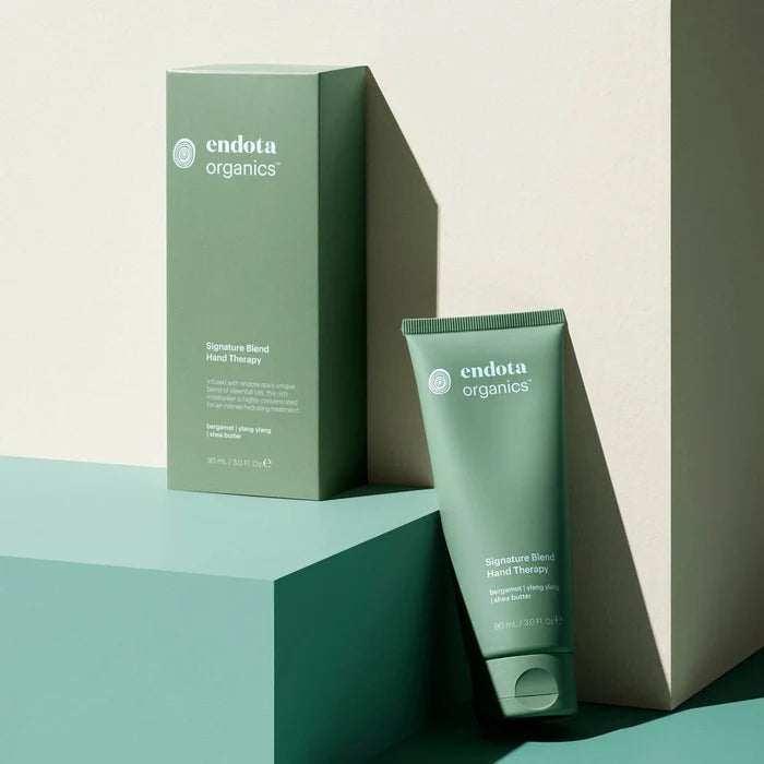 endota organics signature blend hand therapy packaging on a light background.