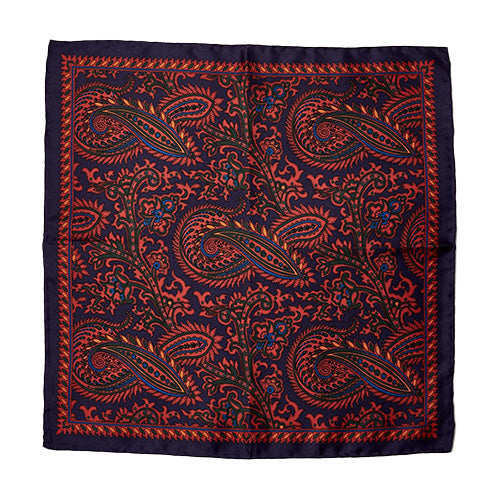 A custom-designed Sovereign Grade 100% Silk Large Paisley Navy Pocket Square from KirbyAllison.com, showcasing rich silk fabric with an elegant large paisley pattern in navy, adding a refined touch to your ensemble, set against a white background.