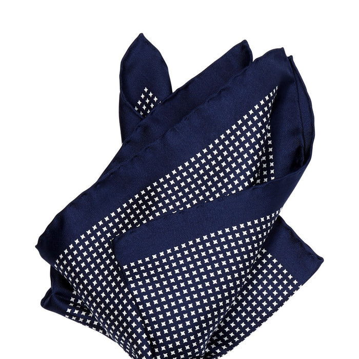 A handmade Sovereign Grade 100% Silk Navy Repeating White Star pocket square from KirbyAllison.com's signature blue and white polka dot pattern.