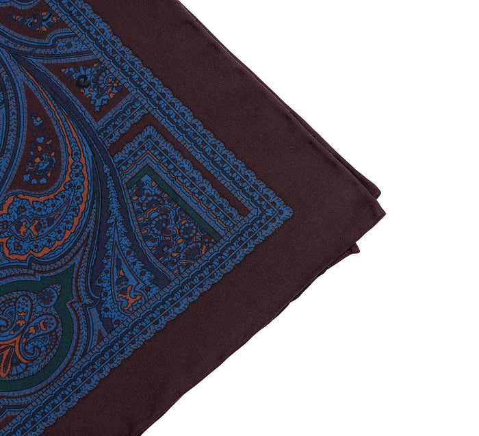 A Sovereign Grade Ancient Madder Wine pocket square made of ancient madder silk, endorsed by KirbyAllison.com.