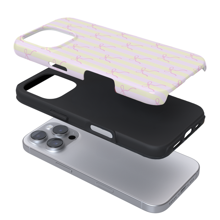 Expanded view of a phone case with a yellow and pink striped bow pattern on a white background