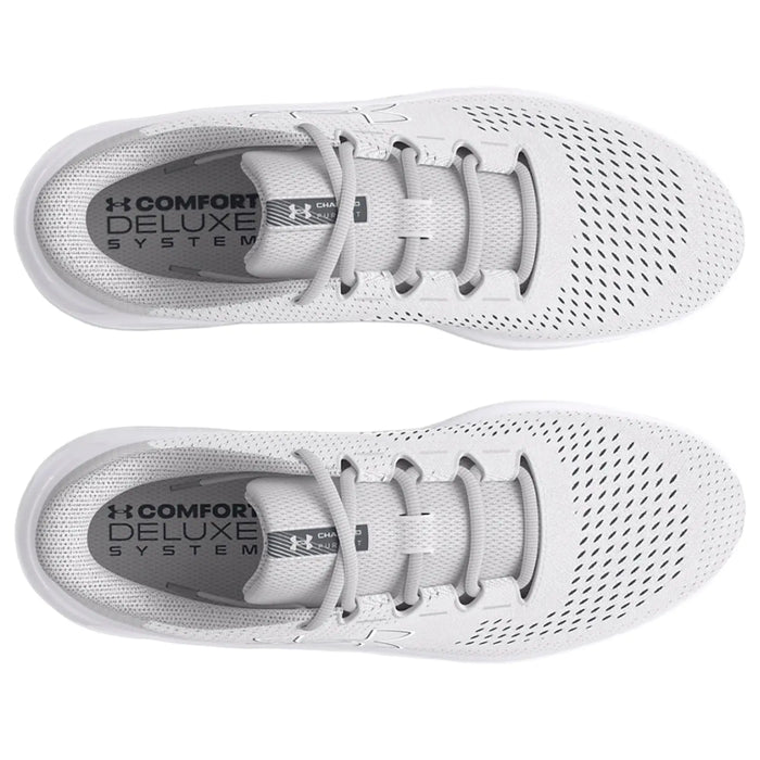 A pair of light gray athletic shoes rests flat with a breathable mesh upper and laces. The insoles display the text COMFORT DELUXE SYSTEM. The background is plain.