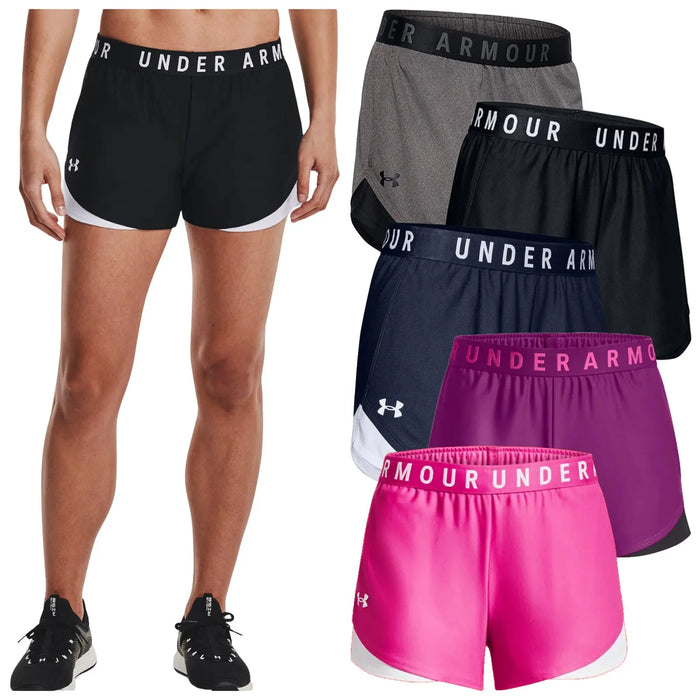 Athletic shorts in various colors are displayed alongside a model wearing a black pair. The shorts feature an elastic waistband and the brand name 'UNDER ARMOUR' prominently on the waistbands.