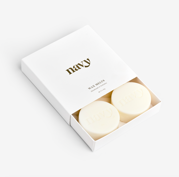 Locally made wax melts in a white box. Contains 4 signature scented melts